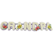 In this image, a personalised floral tribute for a grandfather stretches horizontally across a clean white background, spelling the word "GRANDPA" in solid, three-dimensional letters. Each capital letter is densely packed with delicate white chrysanthemums, giving the arrangement a soft, cushioned appearance, as though the flowers form a continuous, velvety surface. The letters are evenly spaced yet connected along subtle dark green bars, which act as a sturdy base and are mostly hidden beneath the blooms. A fine trim of pale lavender or lilac ribbon runs beneath each letter, just visible around the edges, adding a soothing hint of colour and helping to define the outline of every shape. Four letters are adorned with more vibrant floral groupings that introduce character and warmth. On the left, the 'G' carries a striking spray of deep red anthuriums with their signature waxy, heart-shaped petals and pale yellow spadices, cradled in glossy dark green foliage. The first 'A' features a graceful cluster of yellow-green orchids resting amongst fresh leaves, adding a contemporary, almost tropical note. Near the centre-right, the 'D' is dressed with another rich arrangement of red anthuriums and greenery, providing visual balance. The final 'A' on the far right echoes the first with another spray of lime-toned orchids and lush green foliage. The overall design feels calm and respectful, yet full of life, the white chrysanthemums symbolising peace and the coloured accents suggesting cherished memories. It is easy to imagine this tribute resting at a service in Denmark Hill, a heartfelt farewell created by local florists for a much-missed grandpa.